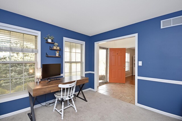 3916 Tallgrass Dr, Champaign, IL 61822 - office with baseboards, tile patterned flooring, carpet floors, and visible vents