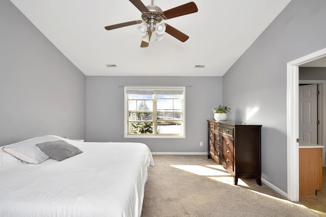 3916 Tallgrass Dr, Champaign, IL 61822 - bedroom featuring visible vents, a ceiling fan, baseboards, carpet flooring, and vaulted ceiling
