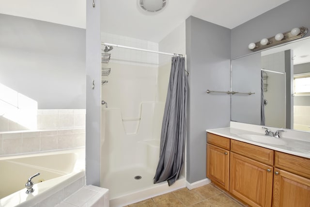 3916 Tallgrass Dr, Champaign, IL 61822 - full bathroom with vanity, a stall shower, tile patterned floors, and a garden tub