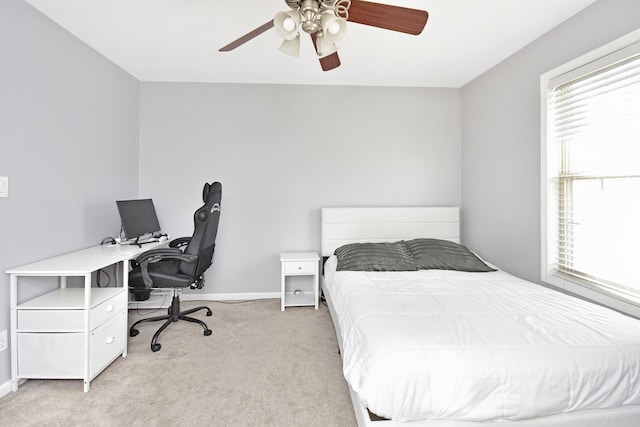 3916 Tallgrass Dr, Champaign, IL 61822 - bedroom with a ceiling fan, baseboards, and light carpet