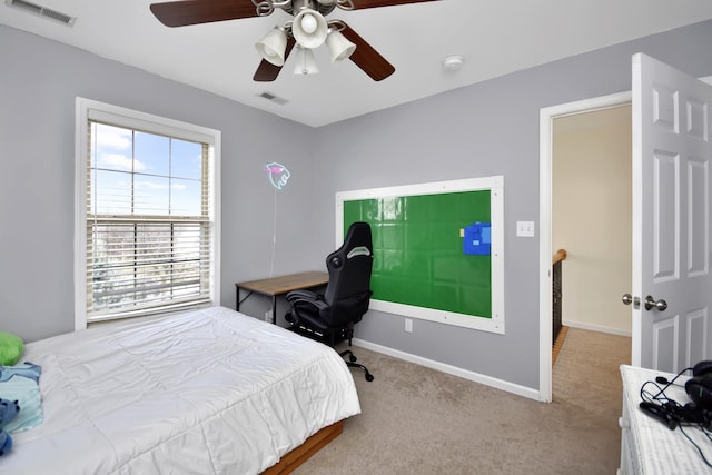 3916 Tallgrass Dr, Champaign, IL 61822 - carpeted bedroom with a ceiling fan, baseboards, and visible vents