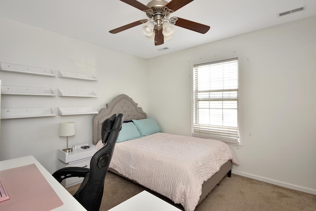 3916 Tallgrass Dr, Champaign, IL 61822 - carpeted bedroom with baseboards, visible vents, and ceiling fan