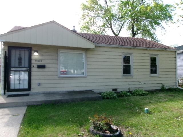 14624 Peoria St, Harvey, IL 60426 - exterior space featuring a front lawn