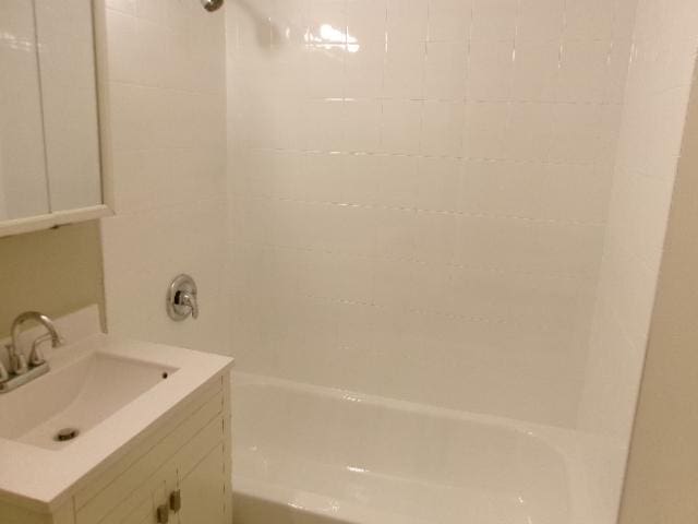 14624 Peoria St, Harvey, IL 60426 - bathroom with bathing tub / shower combination and vanity