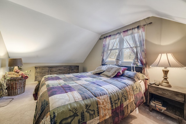 bedroom featuring carpet flooring and vaulted ceiling