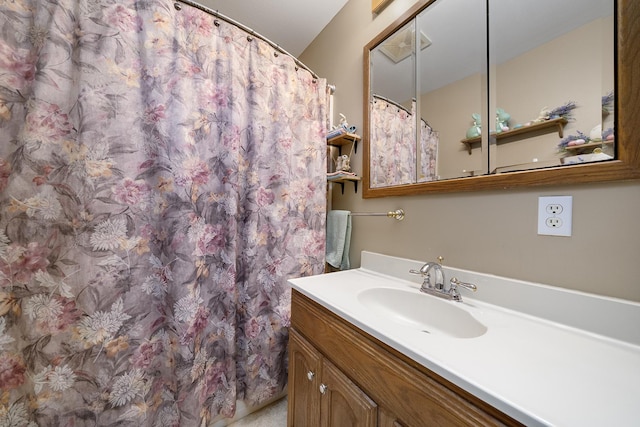 full bathroom with vanity and a shower with curtain