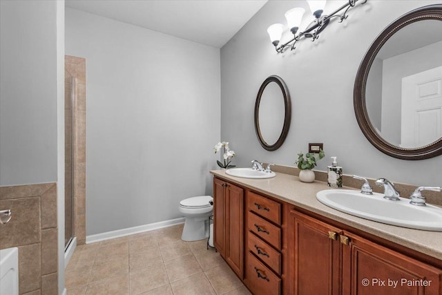 full bathroom with tile patterned flooring, double vanity, tiled shower, and a sink