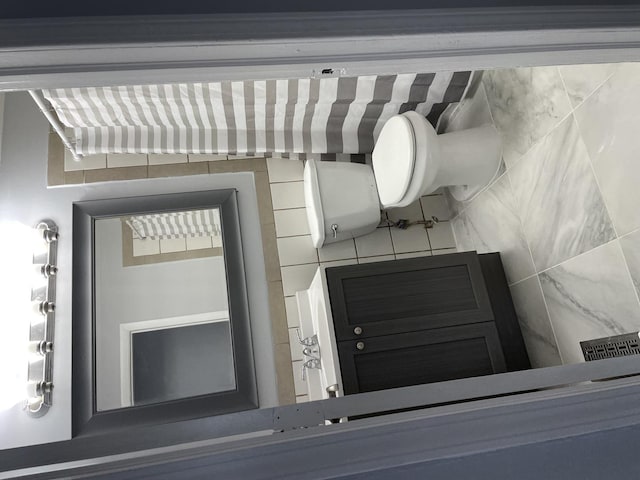 bathroom featuring toilet