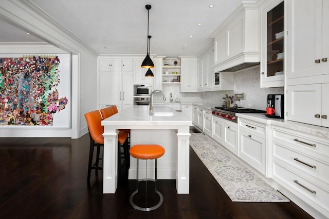 kitchen featuring a sink, stainless steel appliances, open shelves, and white cabinetry