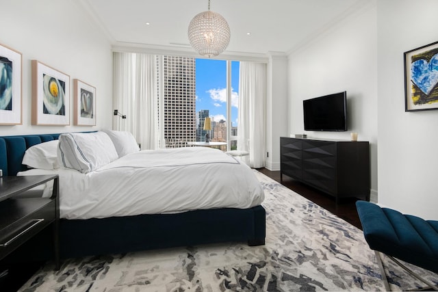 bedroom featuring floor to ceiling windows, wood finished floors, baseboards, and ornamental molding