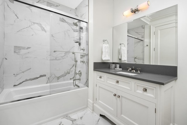 full bathroom with enclosed tub / shower combo, marble finish floor, and vanity