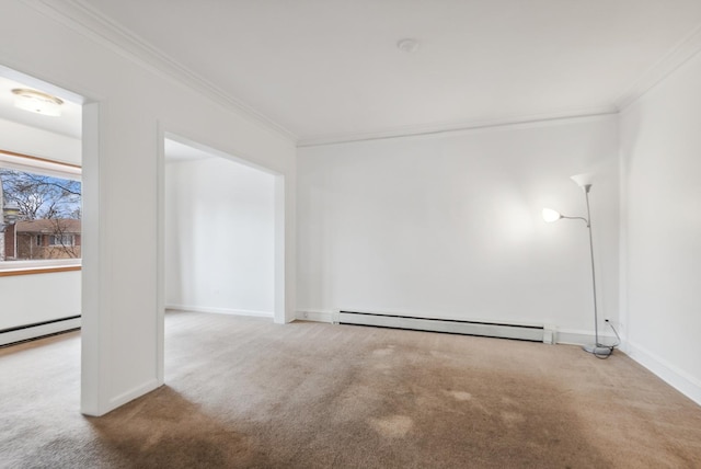 empty room featuring ornamental molding, baseboards, carpet floors, and a baseboard radiator