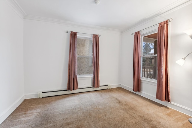 carpeted spare room with a baseboard heating unit, baseboards, and ornamental molding