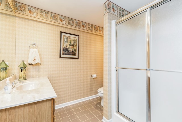 full bathroom featuring wallpapered walls, tile patterned floors, baseboards, and a shower with door