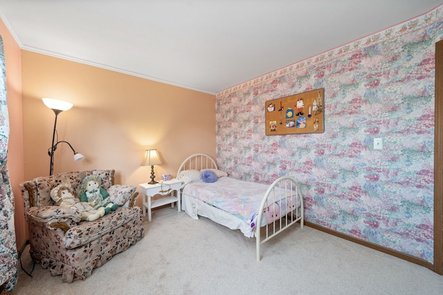 bedroom featuring wallpapered walls, baseboards, carpet flooring, and crown molding