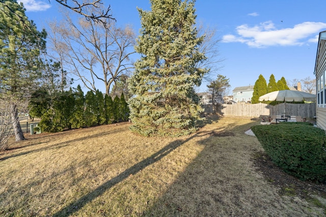 view of yard with fence