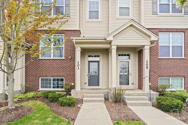 view of front of property with brick siding