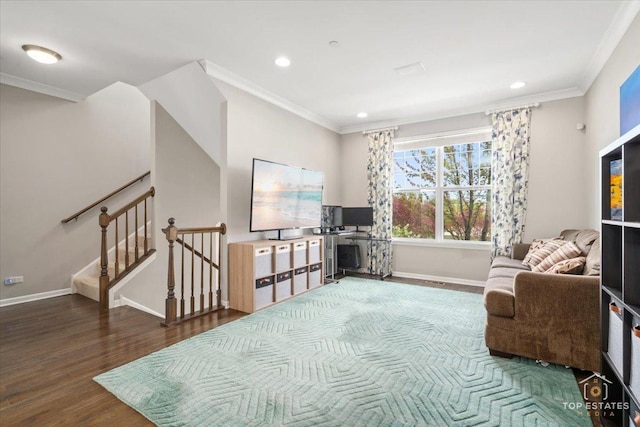 sitting room featuring ornamental molding, wood finished floors, baseboards, recessed lighting, and stairway