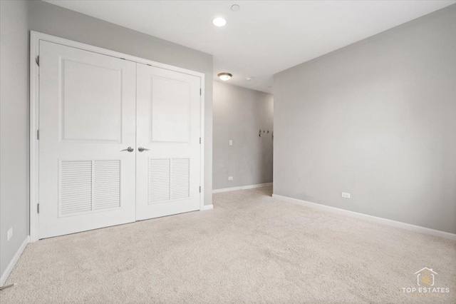 103 Lexington Ln, Rolling Meadows, IL 60008 - unfurnished bedroom featuring carpet, baseboards, a closet, and recessed lighting