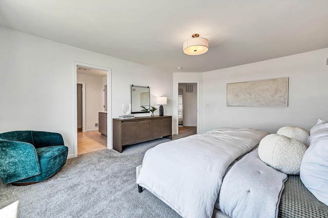 bedroom featuring baseboards and carpet flooring