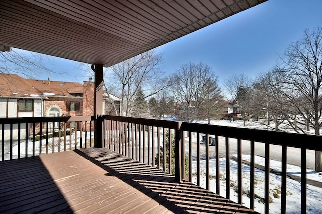 view of snow covered deck