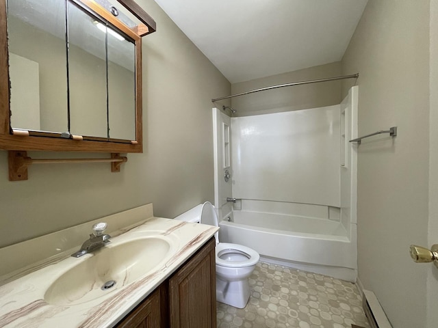 full bath featuring baseboards, toilet, vanity, and bathtub / shower combination