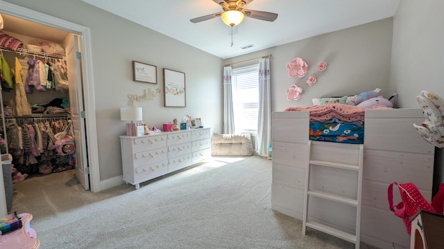 1617 Oliger Dr, Mahomet, IL 61853 - carpeted bedroom with a closet, a ceiling fan, visible vents, and a spacious closet