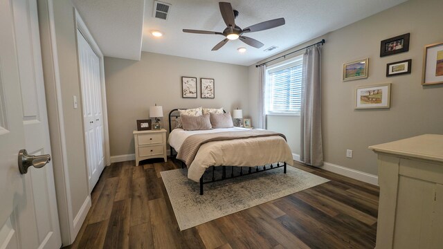 1617 Oliger Dr, Mahomet, IL 61853 - bedroom featuring visible vents, baseboards, and dark wood-style flooring