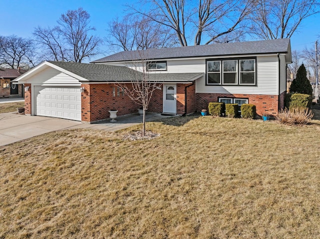 view of front of house with a garage, driveway, brick siding, and a front yard