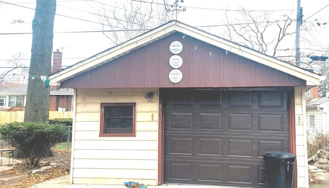 garage featuring fence