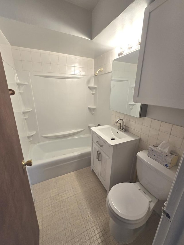 full bath featuring shower / bathing tub combination, tasteful backsplash, toilet, and vanity