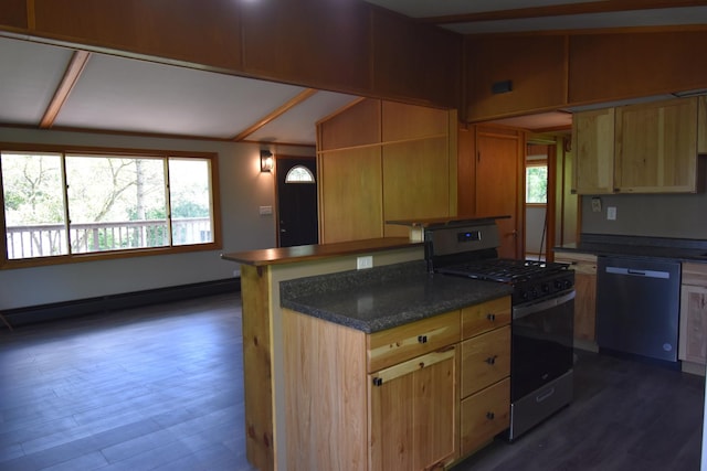 kitchen featuring dishwashing machine, gas range, a healthy amount of sunlight, and a baseboard heating unit