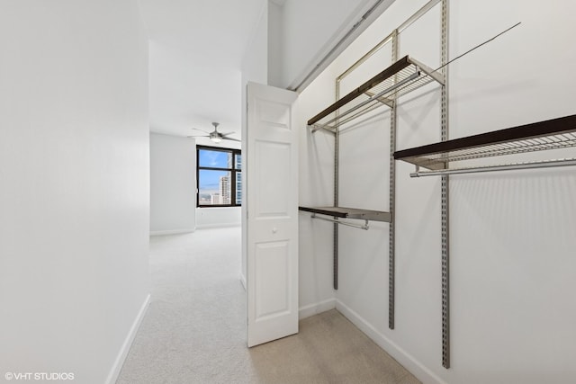 233 E 13th St Unit 2210, Chicago, IL 60605 - walk in closet featuring light colored carpet and ceiling fan