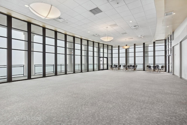 233 E 13th St Unit 2210, Chicago, IL 60605 - spare room with carpet, a high ceiling, and a paneled ceiling