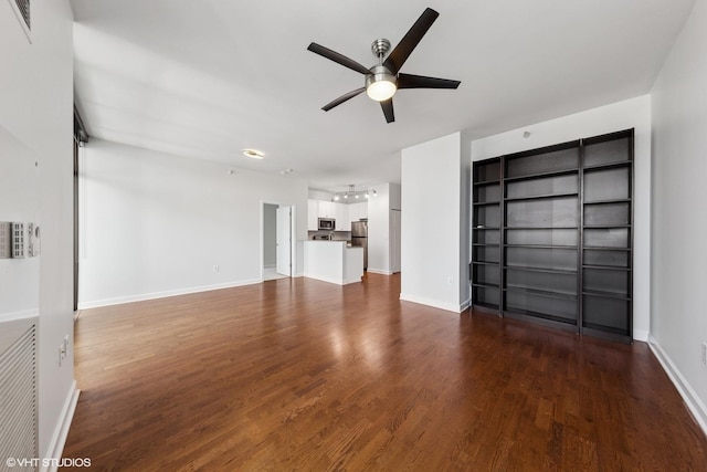 233 E 13th St Unit 2210, Chicago, IL 60605 - unfurnished living room featuring ceiling fan and dark wood finished floors