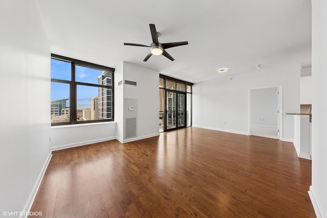 233 E 13th St Unit 2210, Chicago, IL 60605 - unfurnished living room featuring wood finished floors and ceiling fan