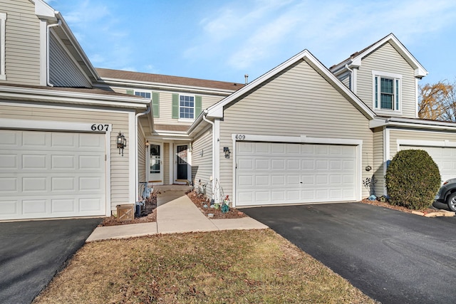 view of front of home with an attached garage and driveway