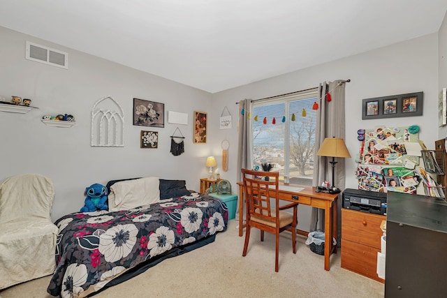 bedroom with visible vents and carpet floors