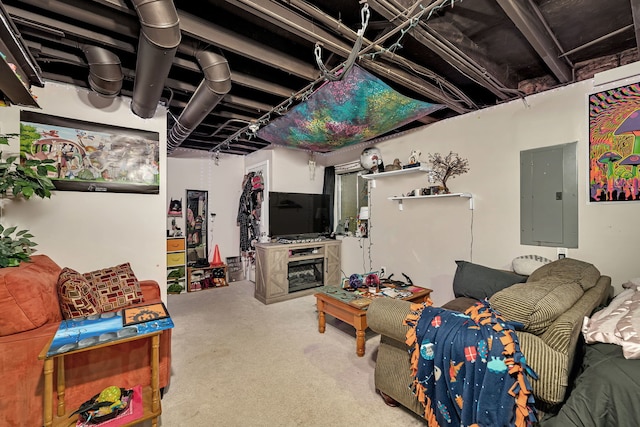 living area with electric panel and concrete floors