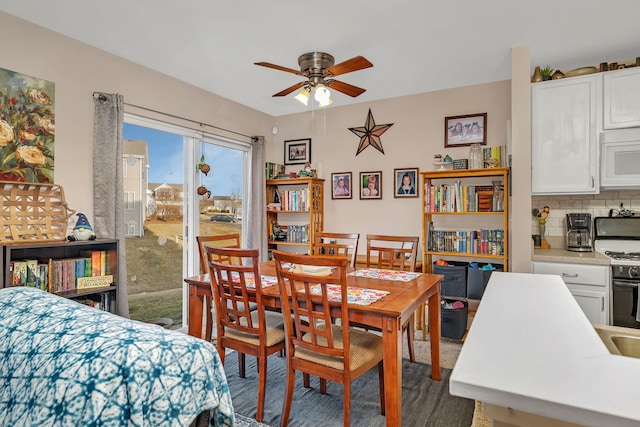 dining room featuring ceiling fan