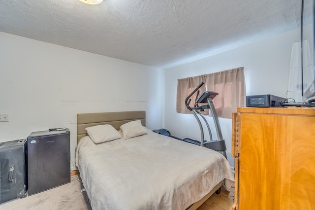 bedroom with a textured ceiling