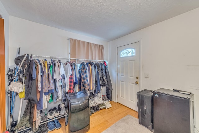 spacious closet with wood finished floors