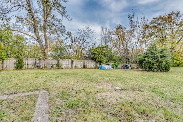 view of yard featuring fence