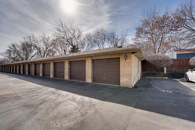 garage featuring fence