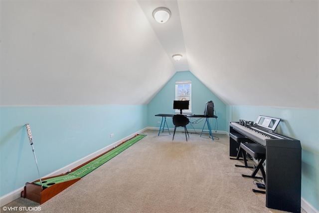 office space with carpet flooring, baseboards, and vaulted ceiling