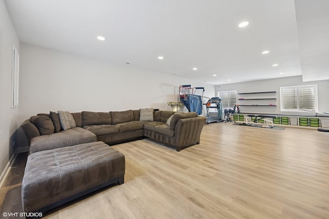 living room with recessed lighting and light wood finished floors