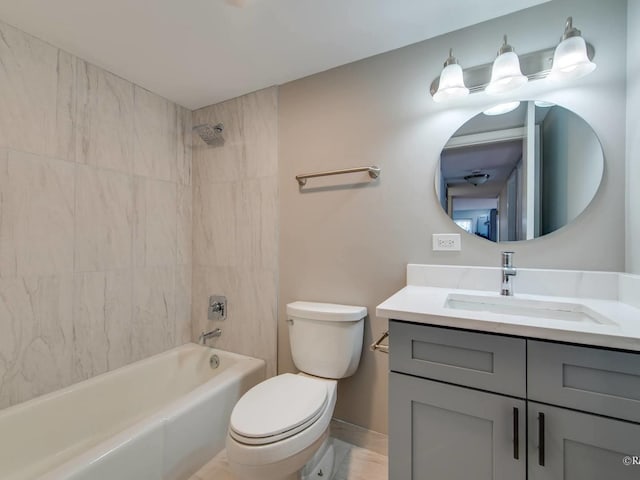 full bath with toilet,  shower combination, and vanity