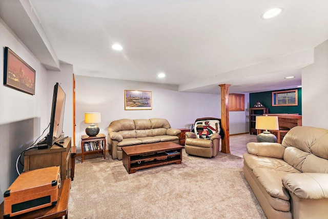 living room with recessed lighting and light carpet