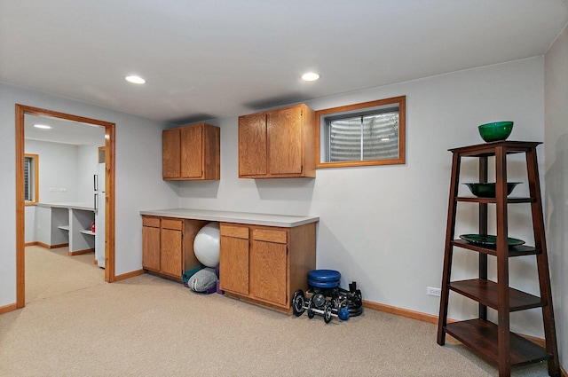 interior space with recessed lighting, light colored carpet, and baseboards