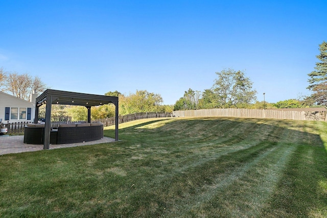 view of yard featuring an outdoor living space, a patio, a fenced backyard, and a pergola